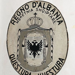 "Coat of arms of Albania during Italian occupation" by Albinfo via Wikimedia Commons (Public Domain)