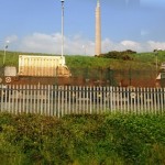 "Nuclear Flasks in the sidings at Sellafield" by Nigel Chadwick (via Wikimedia Commons [CC BY-SA 2.0])