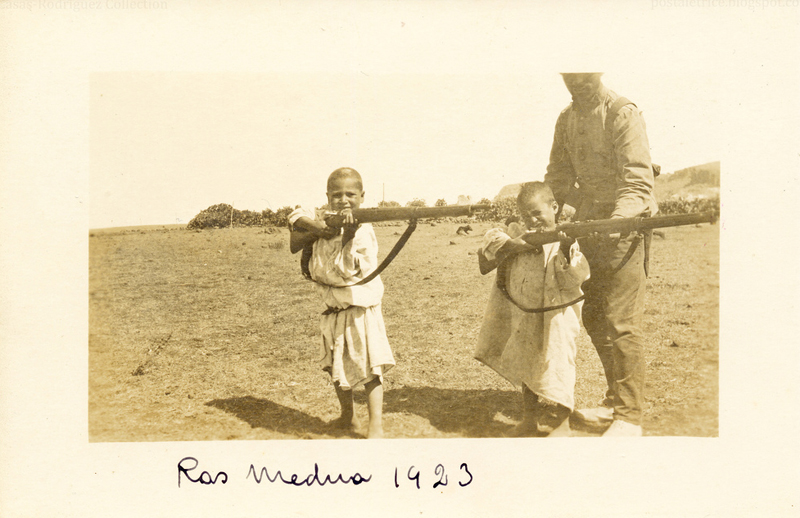 "War In the Rif: Children with Rifles (1923)" by The Casas-Rodríguez Postcard Collection on Flickr (CC BY-NC-ND 2.0)