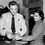 Rosa Parks is fingerprinted at a police station after her arrest in Montgomery, Alabama