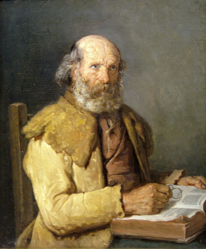 Vieux breton faisant une lecture Vieux breton faisant une lecture